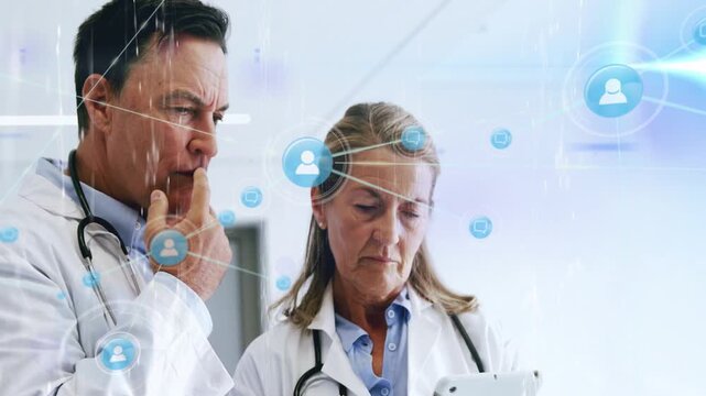 Female doctor holding tablet while male doctor pointing, blue user icons linking clinical data