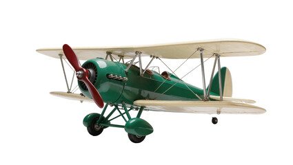 Vintage green biplane model with cream wings and red propeller, an antique airplane toy isolated on transparent background PNG © Saoirse