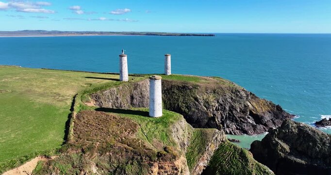 The Three Metalman Towers Tramore Waterford with Brownstown Head and Tramore Bay Epic Ireland Locations