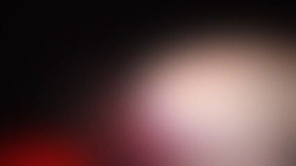 Obraz premium Grainy abstract background with soft blurred gradient transition from deep black to muted red and pale beige light glow in the corner