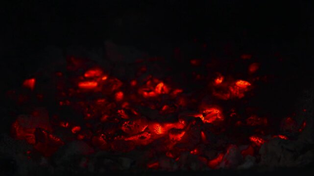 Cinemalike Campfire Ambiance Displaying Glowing Embers Amidst Smoky Haze And Cooling Ashes. Media