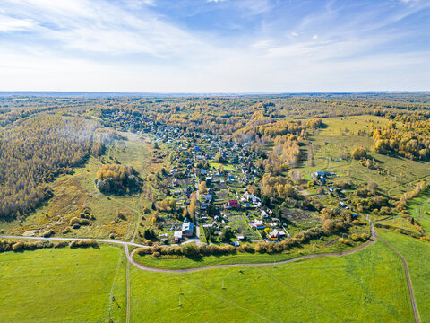 Aerial view of Alexandrovka village with gardening association Alexandrovskie Rodniki near Tebenki in Kemerovo region Kuzbass