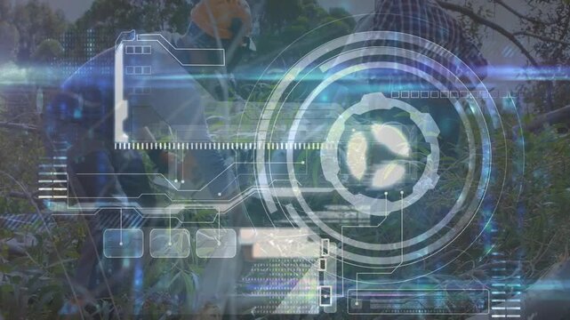 Survey technicians twisting soil auger into forest soil, activating HUD showing depth torque data
