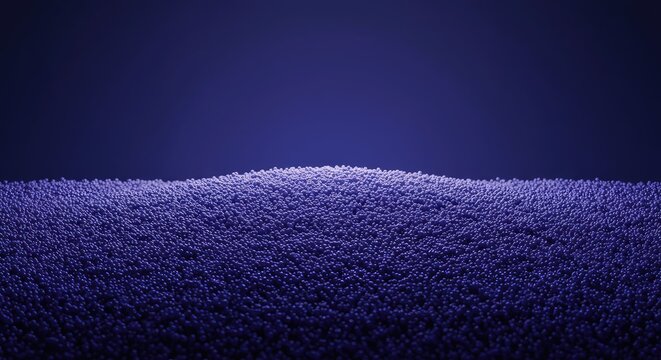 A scientific visualization showing small uniform particles packed densely in the bottom of a container, with a large empty volume above, volume, solid, space