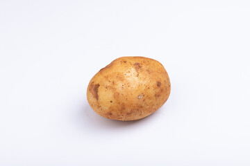Fototapeta premium Fresh potatoes on a white background