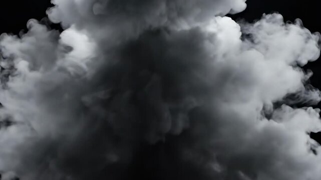 Dramatic dark smoke billowing and swirling against a black background