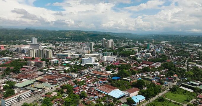 City of Cagayan de Oro with modern buildings and resident area. Northern Mindanao, Philippines.