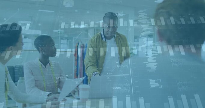 Presenter rising from seat presenting data trends in office displaying animated bar and line charts