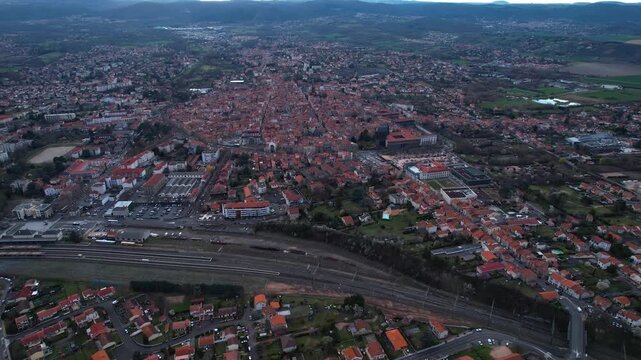 Aerial view around the old town of the city Riom, 63200 in France on a cloudy afternoon in early spring
