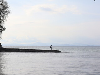 Fototapeta premium Serene Ocean View from Sandy Beach Shore