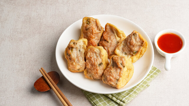 Fried Stuffed Tofu or Tahu Bakso with chili sauce. Indonesian food