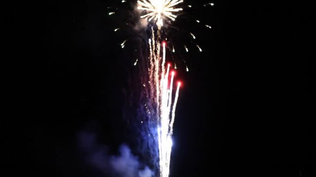 Fireworks exploding in the night sky 1.