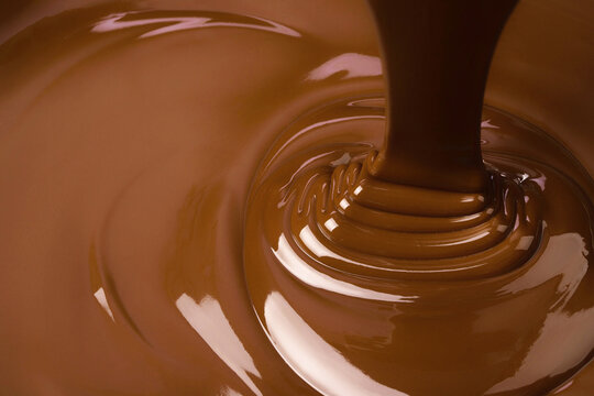 swirl stream chocolate, liquid sauce or sweet cocoa syrup