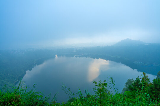 Beautiful foggy lake in the afternoon, Dieng, Wonosobo, Central Java.