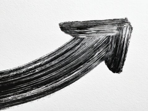 Black painted upward arrow on white textured background, indicating progress and direction