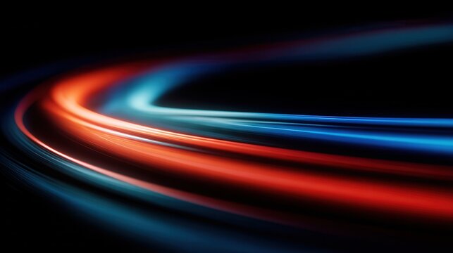 Abstract red and blue light trails on black background