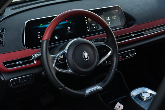 GWM Ora 03 GT steering wheel and dashboard, Modern electric car interior dual digital displays