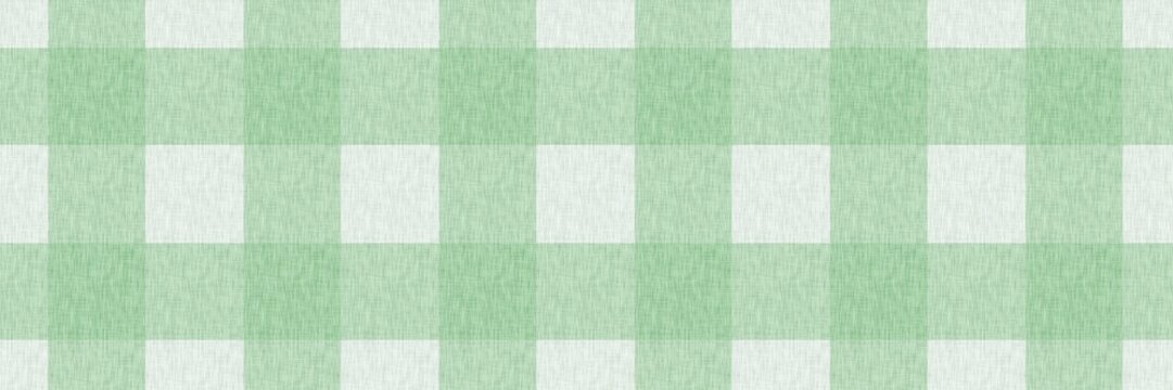 Seamless green gingham pattern background with linen fabric texture. Classic checkered plaid design for spring, picnic, kitchen textiles, and rustic cottagecore aesthetic.