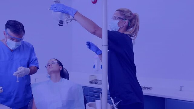 Animation of pattern and purple tint over patient in dentist chair and dentists