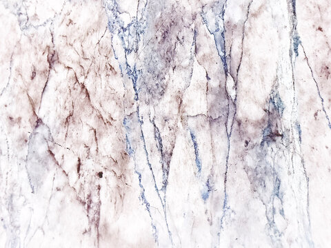 White marble texture with subtle violet and blue veining for elegant interior design background, natural stone surface close-up