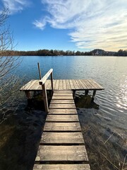 Fototapeta premium wooden pier on the lake in spring season