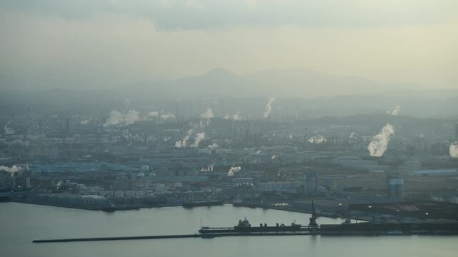 Ulsan Industrial Skyline Timelapse. Oil Refineries, Petrochemical Plants at Sunset with Dramatic Clouds	