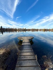 Fototapeta premium natural lake with rustic wooden pier