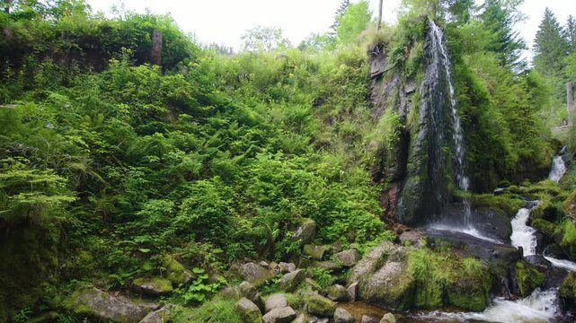 Looking up at Waterfall in Menzenschwander cascade in Black Forest Germany Schwarzwald