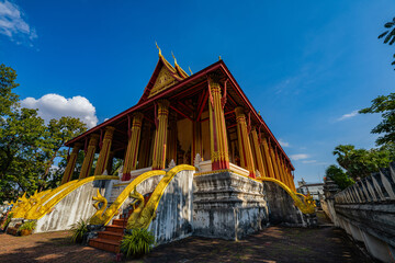 Obraz premium Discover the beauty of Haw Phra Kaew a historic Buddhist temple museum in Laos. Its ornate architecture and cultural significance make it a perfect subject for travel, heritage and spirituality.