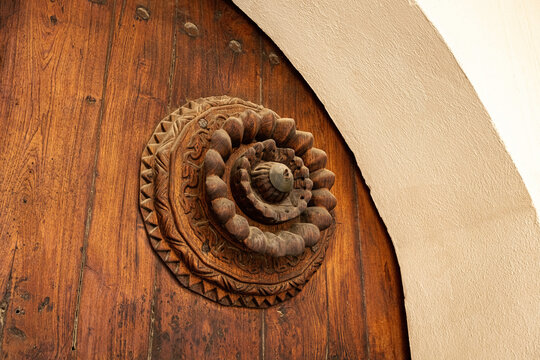 Old wooden door in the Al Shafei mosque seen from Suq Al Jami - Al Mazloum, Al Balad district, Historic Jeddah, Saudi Arabia