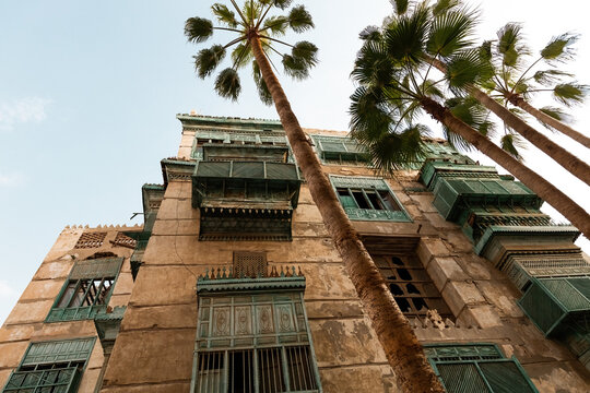 Traditional architecture of old Jeddah town El Balad district houses with wooden windows and balconies Unesco Heritage site in Jeddah Saudi Arabia