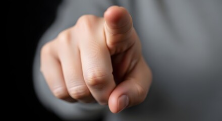 Naklejka premium Direct address a human hand pointing forward, user focus