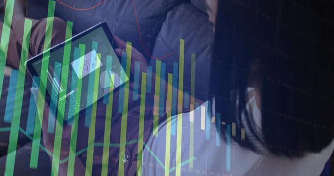 Vertical video: Woman holding tablet on sofa viewing fintech chart as updating bars overlay screen
