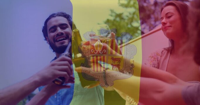 Clinking group raising beer bottles, glass on patio, blue-shirted man starting toast, flag fading