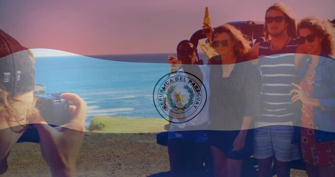 Photog raising camera shooting group cheering bottle aloft, Paraguay flag overlay moving for travel