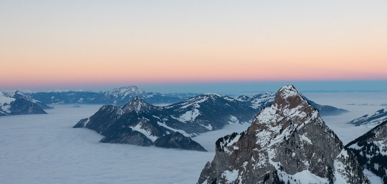 View from the village of Stoos in the Swiss canton of Schwyz in winter, Kleiner Mythen and Grosser Mythen summits in the background.