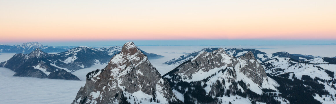 View from the village of Stoos in the Swiss canton of Schwyz in winter, Kleiner Mythen and Grosser Mythen summits in the background.