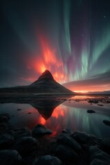 Fototapeta premium A breathtaking digital artwork of the Northern Lights, or aurora borealis, illuminating a mountain reflected in a still body of water surrounded by rocky terrain. The sky is filled with stars.