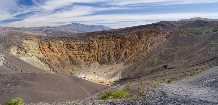 Panoramic view from the rim of Ubehebe Crater in Death Valley during spring bloom, California, March 2026.
