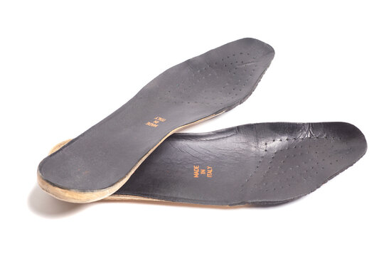 Pair of orthopedic insoles isolated on white