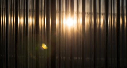 Shining light filtering through metal rod framework with copy space available