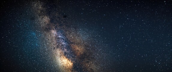 Fototapeta premium grainy long exposure night sky milky way stretching across