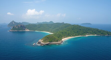 Fototapeta premium Natural island view with lush hills, beaches, and blue waters