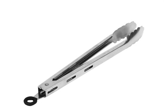 quality assortment of essential kitchen utensils including spatula, whisk, ladle, knives, neatly on a clean white surface, highlighting modern cooking tools and culinary preparation