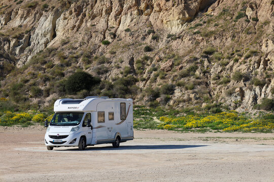 Tourists camping on a motorhome in Bolnuevo town, Murcia
