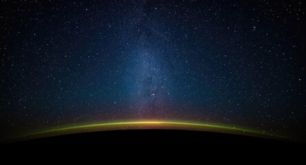 Fototapeta premium Bright meteor entering Earths atmosphere against a star filled sky and curved horizon