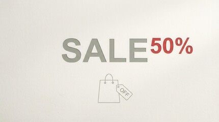 Fototapeta premium Large sale sign showing fifty percent off on various items at a store during a weekend
