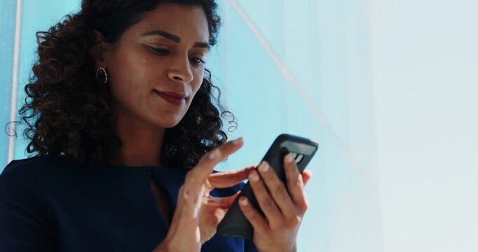 Business, woman and reading in office with phone, website and research for online property listing. Space, female person and real estate agent in workplace with tech, review email and text message.