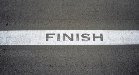 Fototapeta premium High angle shot of a racing circuit finish line with textured surface