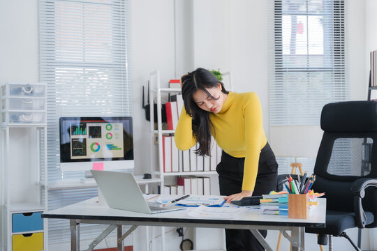Tired teen girl rubbing dry irritable eyes feel eye strain tension migraine after computer work, exhausted young Asian woman student relieving headache pain, bad weak blurry vision, eyesight problem
